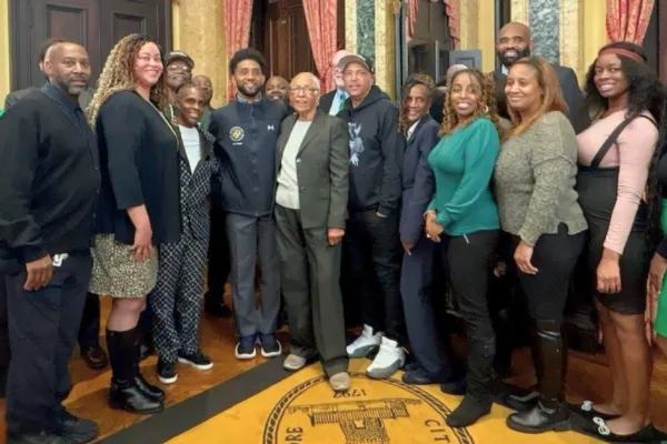 Members of the Baltimore City Municipal bargaining team meet with Mayor Brandon Scott to sign their historic new contract.