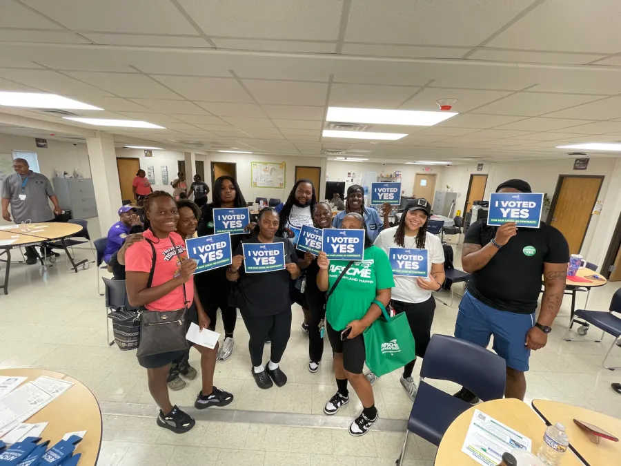 AFSCME Local 44 members celebrate after voting for their new union contract