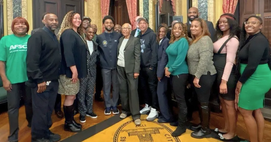 Members of the Baltimore City Municipal bargaining team meet with Mayor Brandon Scott to sign their historic new contract.